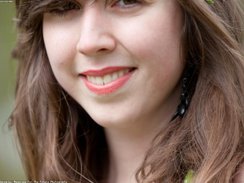 Close-up of a smartphone and tablet displaying IPTV streaming apps (Smarters Pro, TiviMate) with German channels and VOD content, modern tech aesthetic, blue and white color scheme, professional product photography style, shallow depth of field